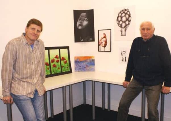 Judges Graham Hodgson and Bob Olley with the winning entries.