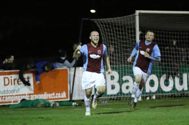 Lewis Teasdale (left) celebrates hitting South Shields' winner against Gateshead. Picture by Peter Talbot