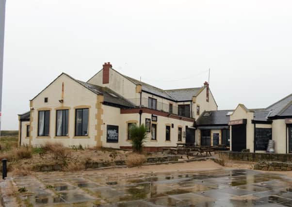 Plans to build a three-storey apartment building on the site of the Waters Edge pub have been pulled.