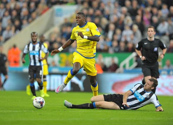 Ex-Newcastle centre-back Mike Williamson (grounded) tries to halt Sheffield Wednesday in a League Cup tie earlier this season