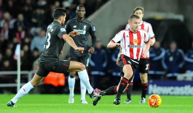 Lee Cattermole gets away from Emre Can in December's meeting of Sunderland and Liverpool. Picture by Frank Reid