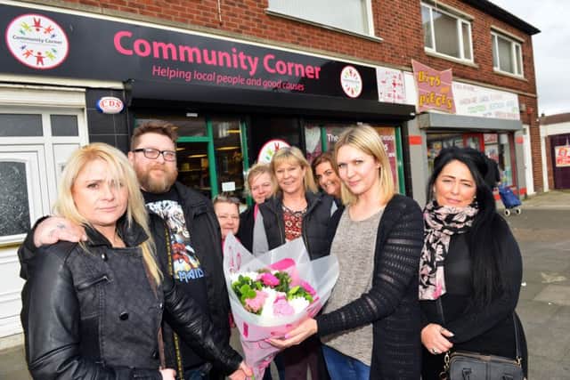 Community Corner receive funds from Tracey and David Keighley following a event in memory of Melissa and Liam.
