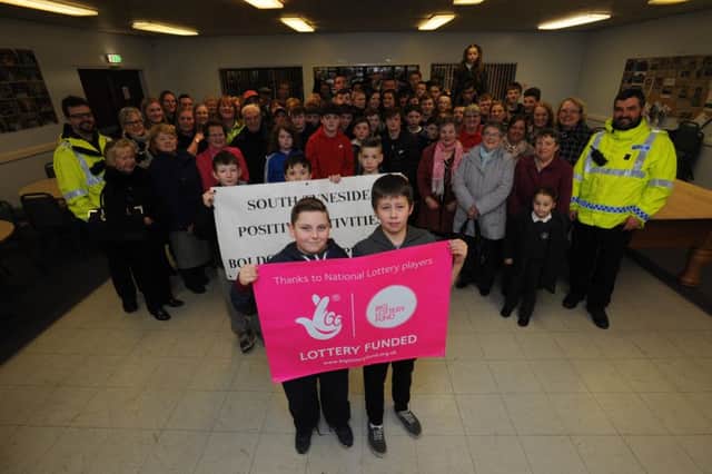 Young people and users of Boldon Village Hall, celebrate their Lottery Grant.