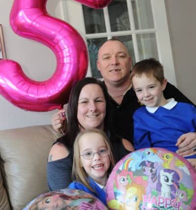 Premature baby Emily Garvock celebrates her 5th birthday, with parents Paul and Lisa, and brother Ben.
