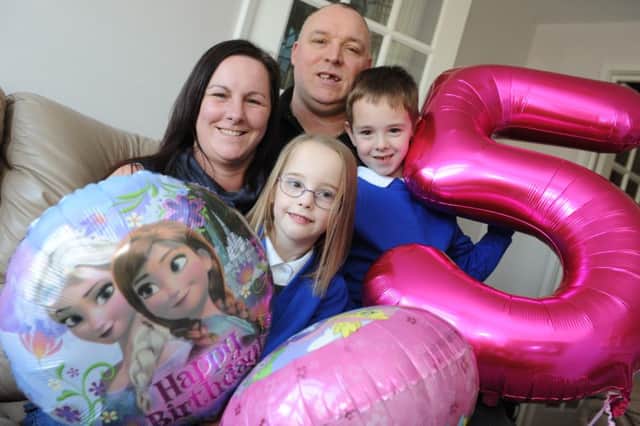Premature baby Emily Garvock celebrates her 5th birthday, with parents Paul and Lisa, and brother Ben.