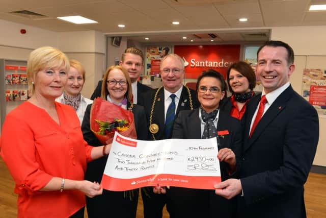 Santander staff donate funds to Cancer Connection after Boxing Day dip.
Cancer Connections Deborah Roberts and area manager Steve Irish with mayor and mayoress Richard and Patricia Porthouse