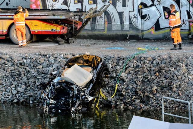 The car Viola Beach were travelling in is recovered from the canal in Stockholm.