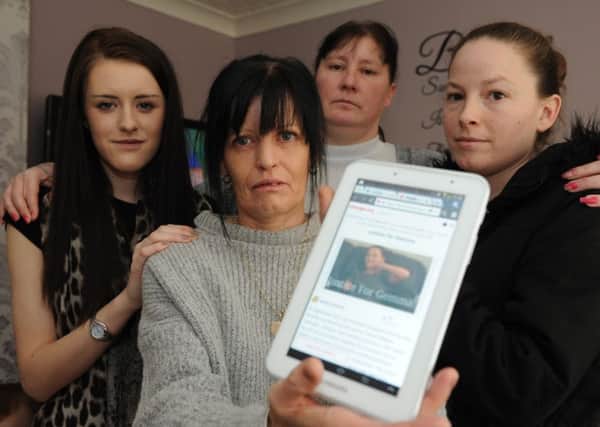 Jennifer Finnigan, centre, with, from left, Kristi Allen, Sharon Potter and Lauren Charlton with the online petition.