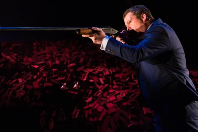 Kevin Wathen takes aim as Jack Carter.  Image by Topher McGrillis.