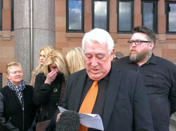 Melissa Liddle's grandfather Robert Lloyd reads out the family statement outside Newcastle Crown Court.