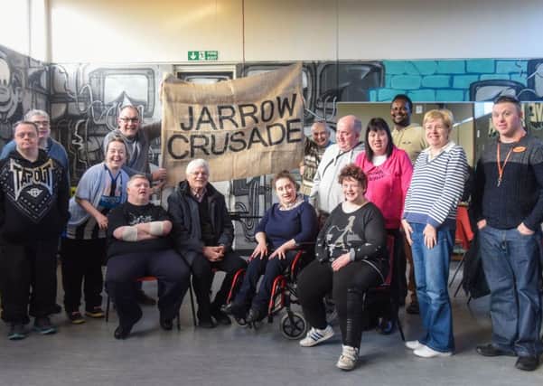Playwright Tom Kelly, seated, fourth left, with members of Ocean Arts at The Customs Space, Captains Row, South Shields, who are rehearsing for a play about the Jarrow Crusade.