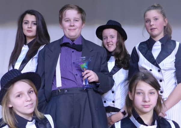 Fat Sam and his gang. Back, from left, Abby Buftain, Alex Johnson, Christina Love. Middle: Liam Millican as Fat Sam. Front, Grace McAdam, left, and Toni Leigh Lugg.