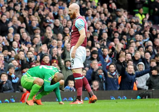 James Collins smiles as Wahbri Khazri rues his rabona
