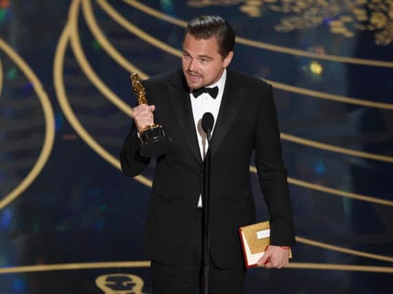 Leonardo DiCaprio with his Oscar. Photo: PA