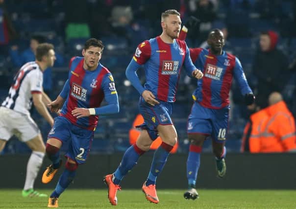 Crystal Palace's former Sunderland striker Connor Wickham celebrates scoring.