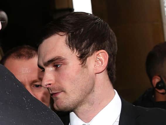 Footballer Adam Johnson arrives at Bradford Crown Court, where the jury has been sent out to consider its verdict.