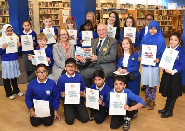Mayor of South Tyneside, Coun Richard Porthouse, and his wife Patricia with pupils from Westoe Crown Primary School and Marine Park Primary School who undertook a 10-week online creative writing camp working with Flowing Tales and the Library Service.