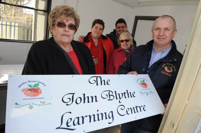 Margaret Blythe is joined by family members Victoria Buglass, Jonathan Blythe and Margaret Newman, as their open the new learning centre at Holder House Allotments named in memory of her husband John Blythe, with project manager Chris Convery.