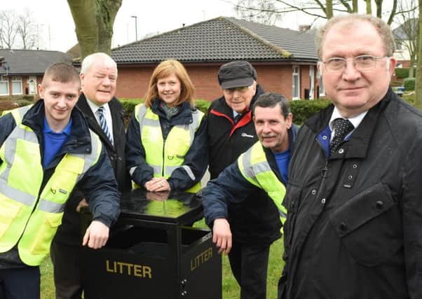 With a new bin are, from left, ground maintenance worker Curtis Marshall, Coun Jim Sewell, Chairman of the Hebburn Community Area Forum, delivery officer Louise Landreth, Deputy council leader Coun Alan Kerr, Clive Sanderson from the ground maintenance team and resident Bede Woods.
