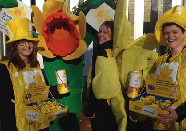 Fundraisers collecting for the Great daffodil Appeal.