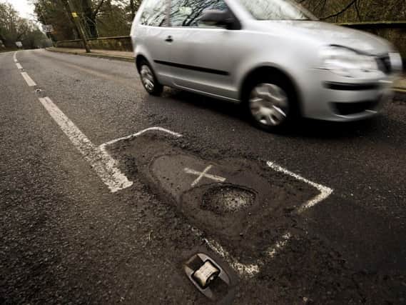 Has your car been damaged by potholes?