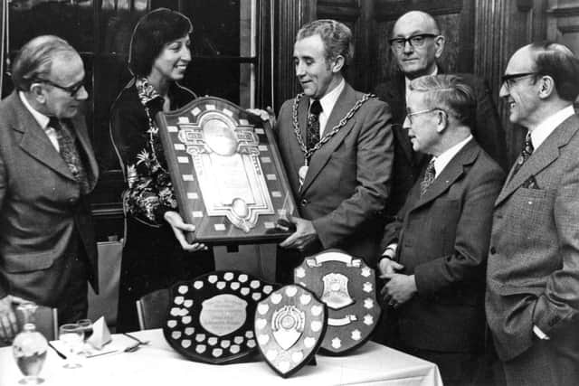 Ann Darling pictured in December 1977 as she presented trophies from South Tyneside National Savings Commmittee as it was officially wound up.
She presented a shield to deputy mayor Councillor Hugh Downey  committee chairman as Mr Fred Mack, regional commissioner (left); Mr Ross Arnott, regional chairman; Mr Len Rumney, South Tyneside secretary, and Mr J H Hedley, South Tyneside treasuer, look on.