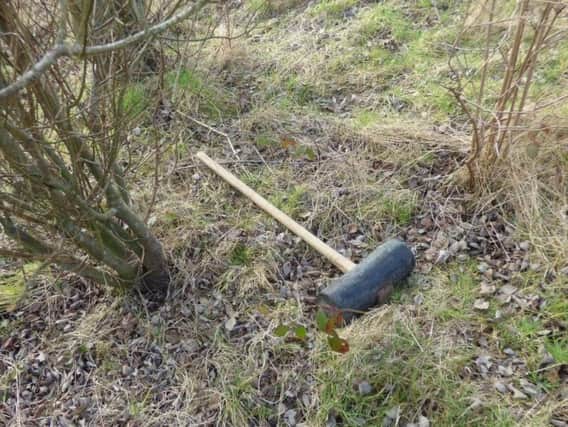 A shocked witness believes this mallet may have been used to cause a trail of destruction at a Hebburn beauty spot.