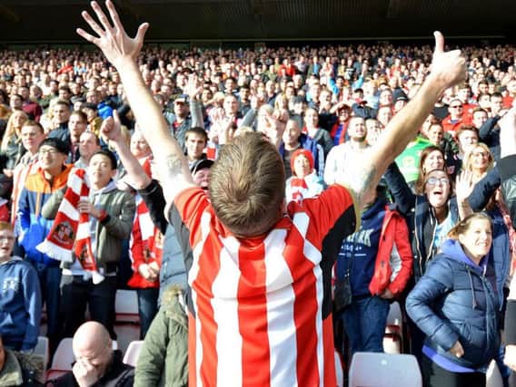 Sunderland fans celebrate at the derby in October 2015.