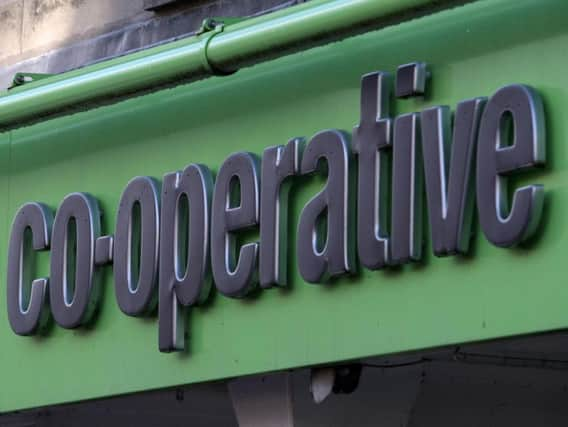 A Co-operative sign.  Photo: David Cheskin/PA Wire