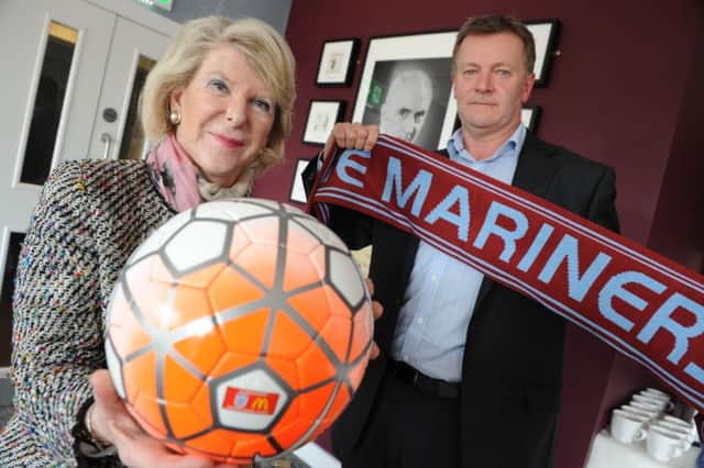 Dame Margaret Barbour officially opens the Malcolm Barbour Lounge at South Shields Football Club's Mariners Park, with club managing director Michael Orr.
