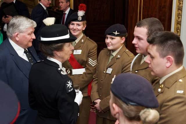 Cadet Corporal Paige Cowton, of Hebburn Army Cadet Force, meets the Princess Royal at Buckingham Palace.