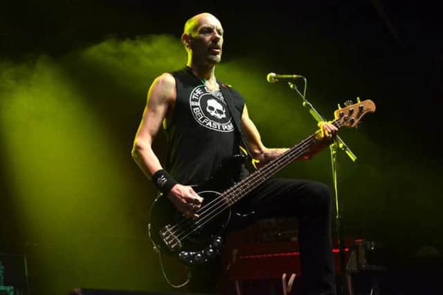 Stiff Little Fingers bass player Ali McMordie performing at the O2 Academy. Pic: Gary Welford.