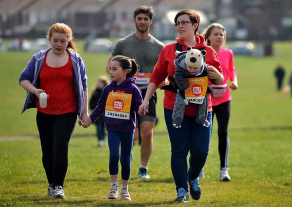 Runners taking part in the Sport Relief event at South shields on Sunday.