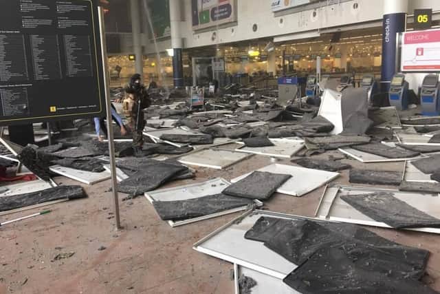 Scenes from Brussels airport following a 'suspected suicide attack'.