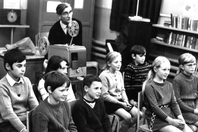 Youngsters being shown a film back in the 1970s.