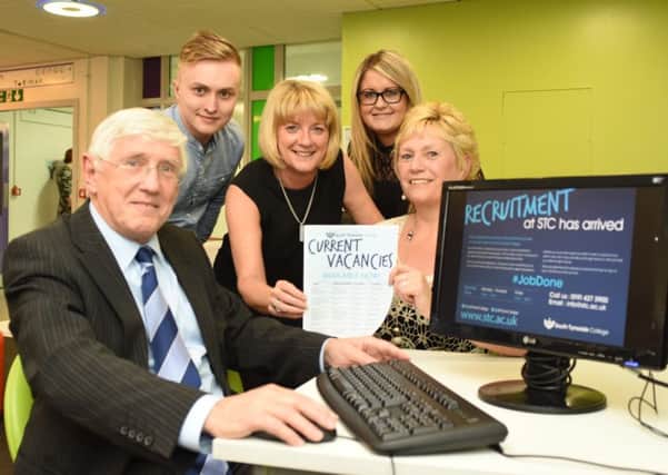 Coun John Anglin and Alison Maynard, Principal of South Tyneside College Professional and Vocational College, join staff to launch the job hub.