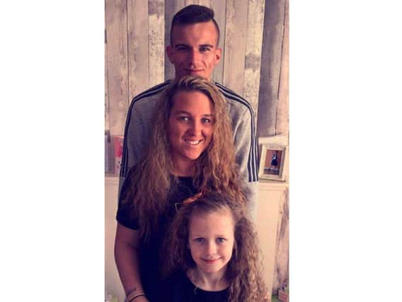 James Wilson with his girlfriend Kayleigh Reay and her daughter Lexie, who he called his 'Queen' and 'Princess'.