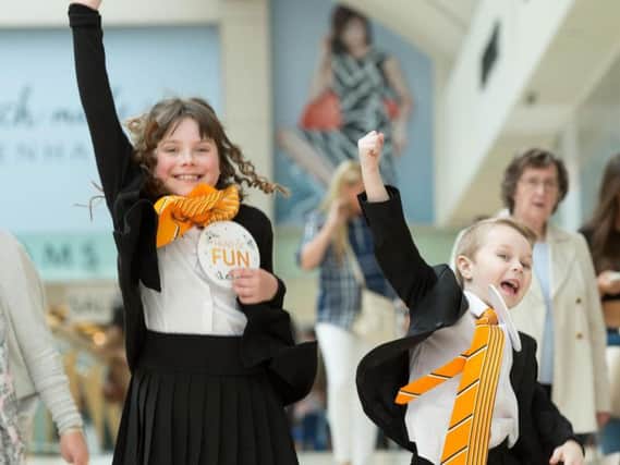 Esther Bennettand Logan Jackson celebrate their roles.