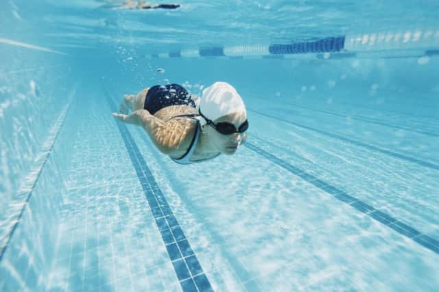 A woman swimming in a swimming pool. PA Photo/thinkstockphotos