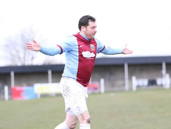 Warren Byrne celebrates his incredible goal for South Shields against Tow Law Town. Image by Peter Talbot.