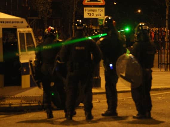 A laser pen being used against police, who are being forced to respond to thousands of incidents, which has resulted in calls for them to be classed as offensive weapons.