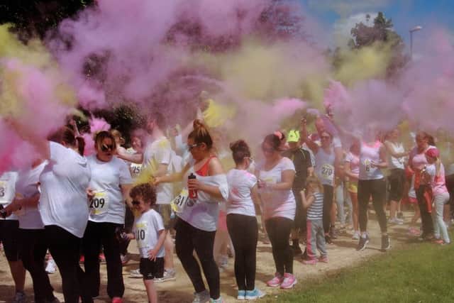 Fundraisers taking part in the St Clare's Hospice Rainbow Run.
