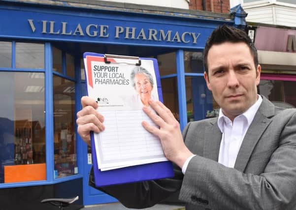David Townsley  is gathering signatures to try to protect village pharmacies.
