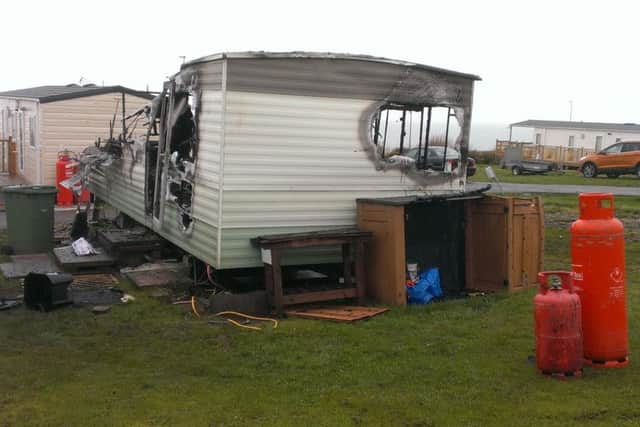 The man inside the caravan had the presence of mind to move gas cannisters.