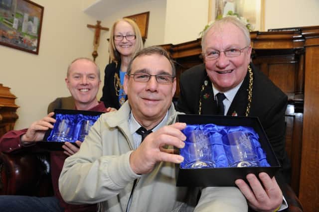 South Tyneside Council Waste Team members Lawrence Pettimore, front, and Lawrence Bain receive thank you gifts from the Mayor Coun Richard Porthouse and Mayoress Patricia Porthouse.