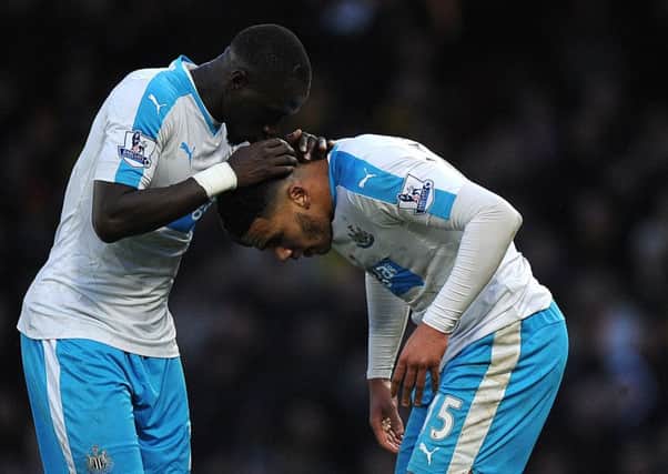 Newcastle Uniteds Jamaal Lascelles (right) celebrates with Moussa Sissoko after scoring against Watford back in January.