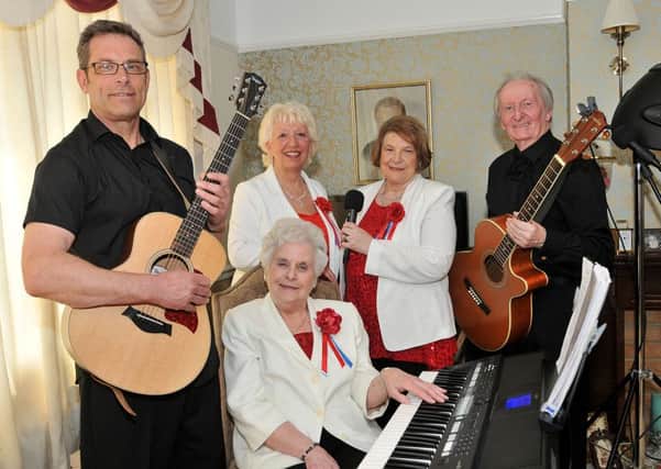Harmony For You members (left to right) Jim Gillies, Joan Carter, Jean Watson, Bill Quigley and Norma Bolingbrooke on keyboard.
