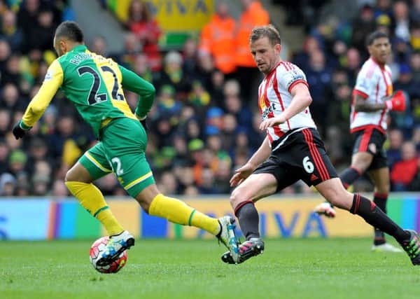 Lee Cattermole chases Norwich's Nathan Redmond last weekend. Picture by Frank Reid