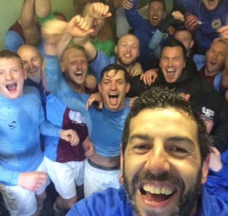 Julio Arca, front, and the rest of the South Shields players celebrate their title victory in the dressing room.