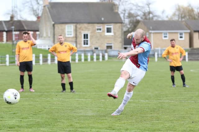 Lewis Teasdale smashes in his penalty for South Shields against Crook. Image by Peter Talbot.